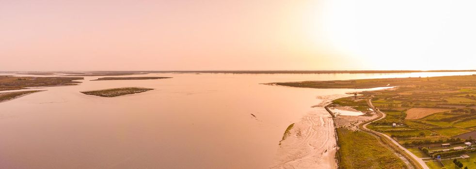 Aerial View of Aveiro Lagoon at sunset, view from Bico's beach in Murtosa, Aveiro, Portugal.