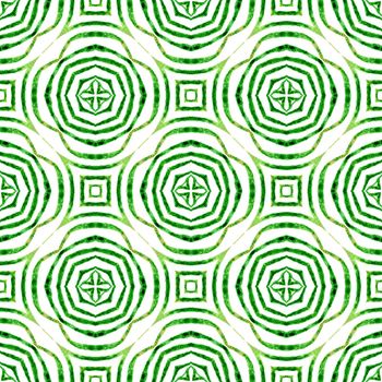 Textile ready superb print, swimwear fabric, wallpaper, wrapping. Green pleasant boho chic summer design. Watercolor ikat repeating tile border. Ikat repeating swimwear design.