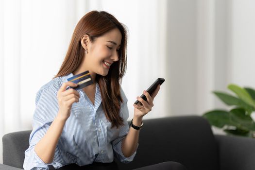 A businesswoman completes KYC using an online banking program in order to open a digital savings account. The definition of cyber security