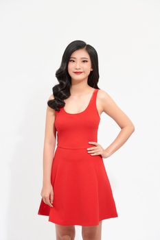beautiful young woman with long black hair wearing red dress