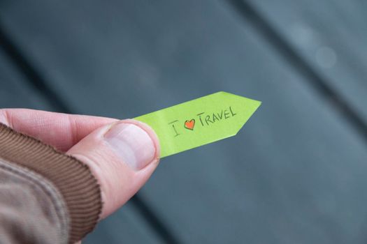 I love to travel idea. The inscription on the tag.