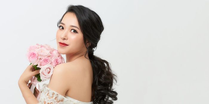 portrait of Attractive asian woman with makeup and wedding hair style