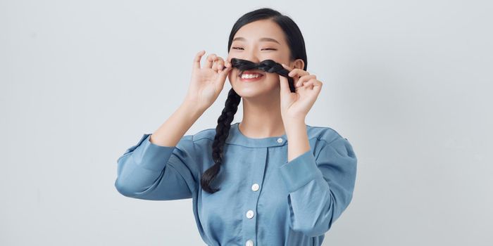 portrait cheerful funny young woman hairstyle two long tail 