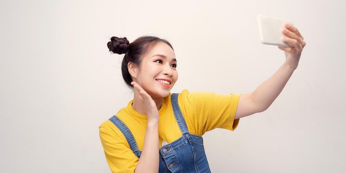 a beautiful girl taking selfie