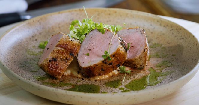 Pork meal Prepared for Serving - Art Food, Gourmet Meal Close Up.