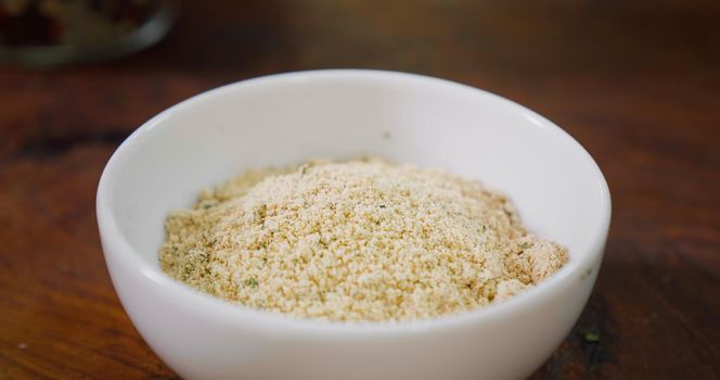 Meat spices in a bowl in the kitchen.