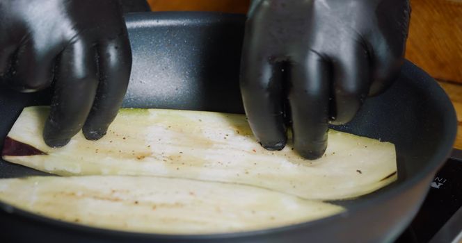 Frying Sliced Eggplant in the Hot Pan Delicious Vegetables.