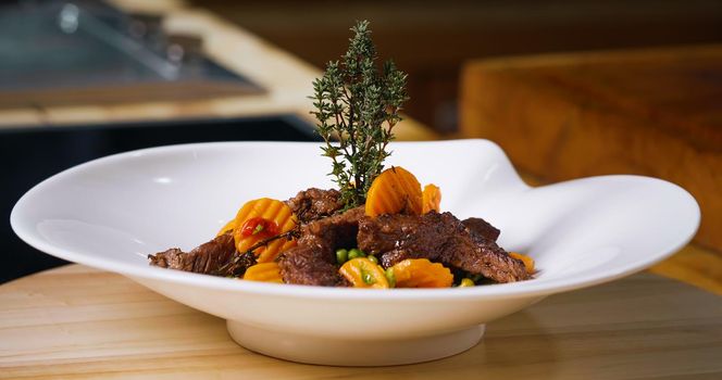 Beef Meal Presentation on White Plate. Chef Specialty Dish.