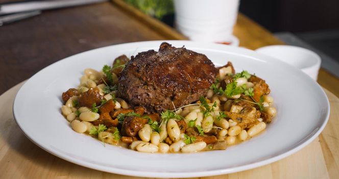 White Plate with delicious Beef Food dish.