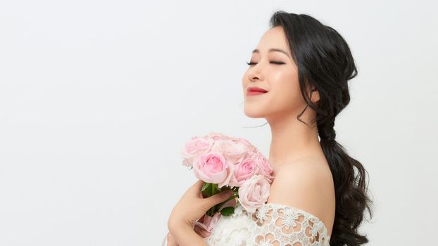 Young Happy Bride With Flower Bouquet