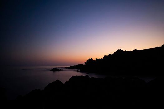 Typical beach with lava in the sea of Linosa one of the Pelagie Islands in the Sicily Channel of the Mediterranean Sea