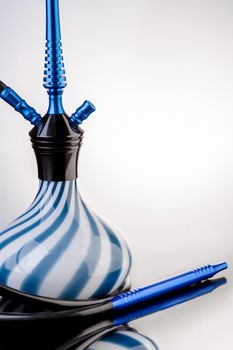 Part of blue hookah on white background. Still life. Copy space