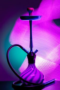 Blue hookah. Interesting background. Abstract background. Disco background. Still life. Copy space