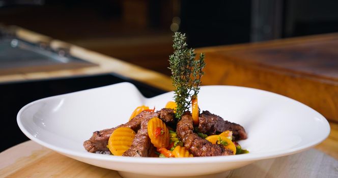 Beef Meal Presentation on White Plate . Chef Specialty Dish.