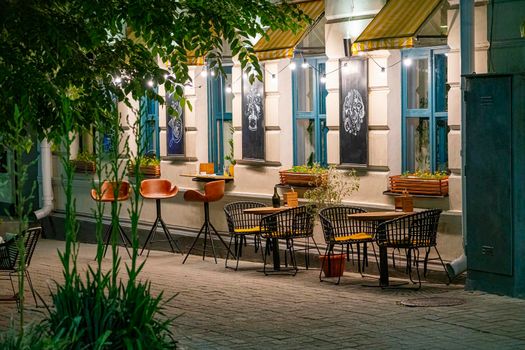 outdoor cafe in the evening without people. Photo