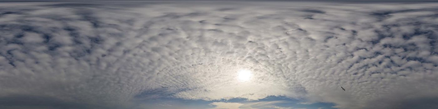 Dark blue sunset sky panorama with pink Cumulus clouds. Seamless hdr 360 pano in spherical equirectangular format. Full zenith for 3D visualization, game, sky replacement for aerial drone panoramas