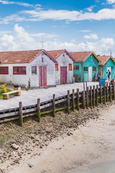 Colorful cabins on the harbor of Château d'Oléron, on the island of Oléron in France