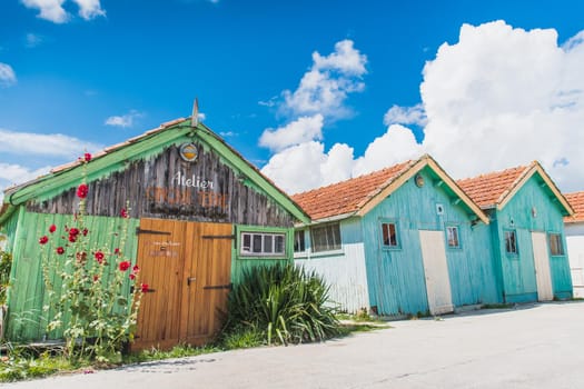 Colorful cabins on the harbor of Château d'Oléron, on the island of Oléron in France