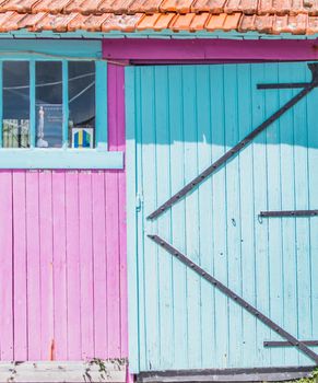 Colorful cabins on the harbor of Château d'Oléron, on the island of Oléron in France