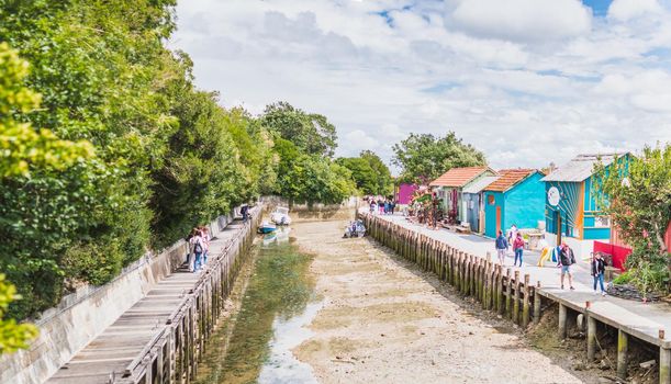 Colorful huts on the harbor of Château d'Oléron, on the island of Oléron in France