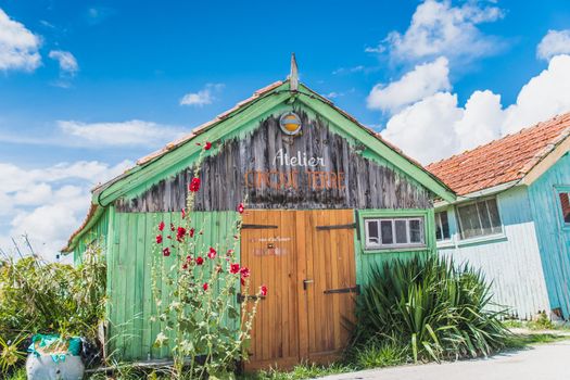 Colorful cabins on the harbor of Château d'Oléron, on the island of Oléron in France