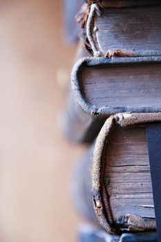 School or library concept. Old vintage books on the shelf.