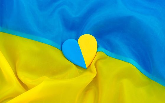Heart on Ukrainian flag beautiful background. Selective focus. Love.