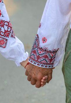 Ukrainian grandmother and granddaughter in vyshyvanka. selective focus. Kid.