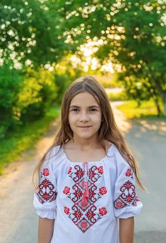 Ukrainian girl child in vyshyvanka. Selective focus. Kid.