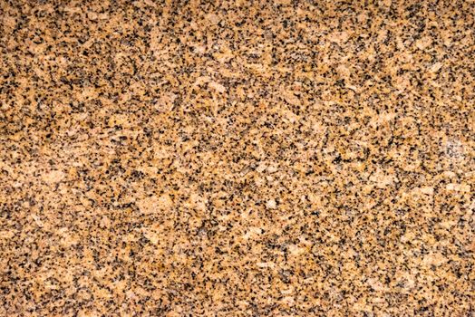 Decorative granite cut facet. Natural stone texture background.