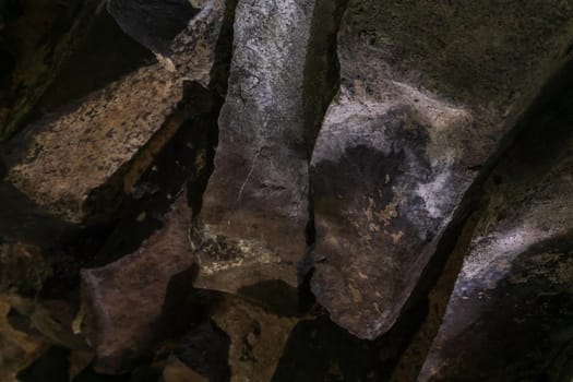 Texture of an ancient stone arch background close up