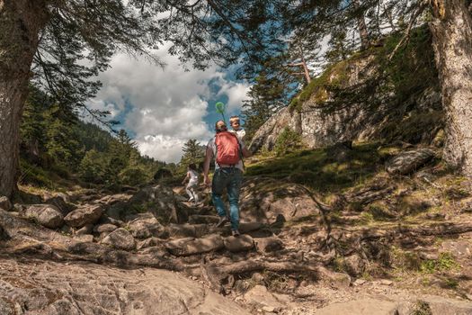 Family hiking in the mountain