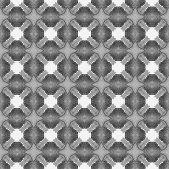 Watercolor ikat repeating tile border. Black and white brilliant boho chic summer design. Textile ready neat print, swimwear fabric, wallpaper, wrapping. Ikat repeating swimwear design.
