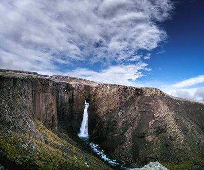 Litlanefoss and Hengifoss waterfall with basalt columns closeup panorama