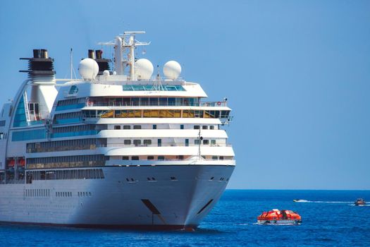 Large white cruise liner passenger ship on the sea in the Mediterranean