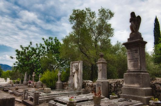 Tombs, statues and headstones in a graveyard