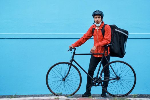 Shot of a delivery man out with his bicycle.