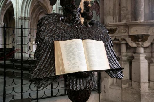 DIEPPE, FRANCE - FEBRUARY 05, 2019: An open bible on a stand in the shape of an eagle in a catholic Saint-Jacques church
