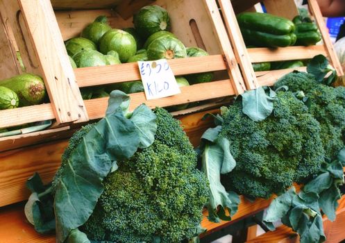 Market vendor cart with varied vegetables