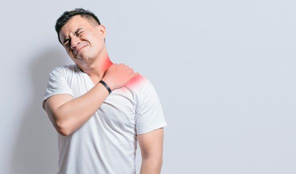 Neck and back pain concept, man with neck and back muscle pain, Close up of man with neck and back pain, a man with muscle pain on isolated background.