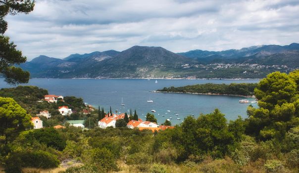 Village on a hill overlooking a bay on an island in the Mediterranean