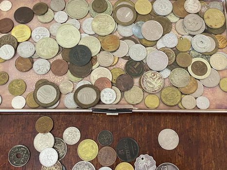 collection of coins of various denominations from different countries.