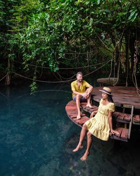 Klong Sa Kaew Krabi Thailand mangrove forest is popular for kayaking in the river of Krabi Thailand. Young Asian woman and European men at the lake