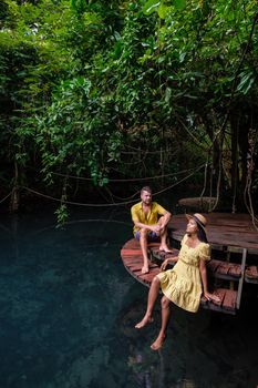 Klong Sa Kaew Krabi Thailand mangrove forest is popular for kayaking in the river of Krabi Thailand. Young Asian woman and European men at the lake