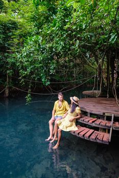 Klong Sa Kaew Krabi Thailand mangrove forest is popular for kayaking in the river of Krabi Thailand. Young Asian woman and European men at the lake