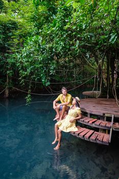 Klong Sa Kaew Krabi Thailand mangrove forest is popular for kayaking in the river of Krabi Thailand. Young Asian woman and European men at the lake