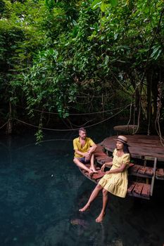 Klong Sa Kaew Krabi Thailand mangrove forest is popular for kayaking in the river of Krabi Thailand. Young Asian woman and European men at the lake