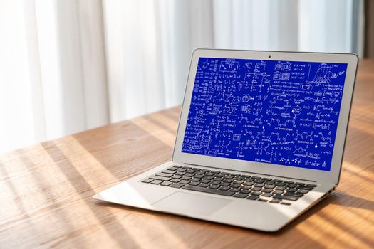 Mathematic equations and modish formula on computer screen showing concept of science and education