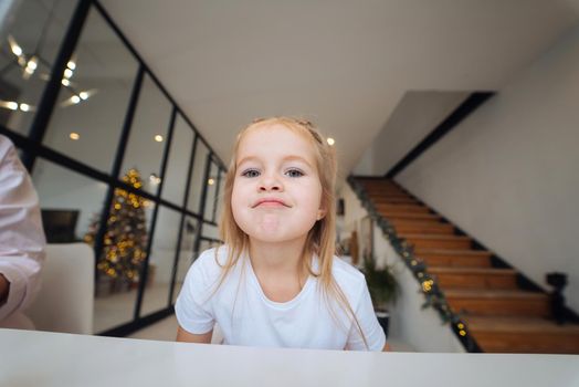 Adorable little girl looking at the camera