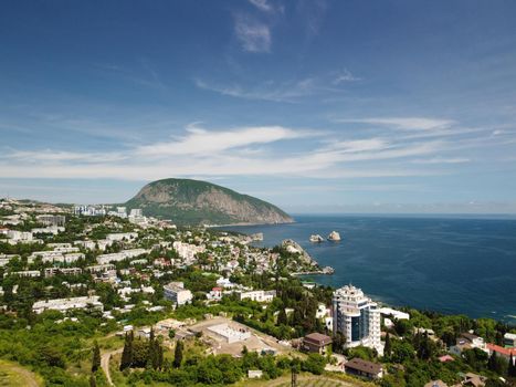 Black Sea coast near Gurzuf resort village in Crimea with Ayu-Dag mountain in the background,